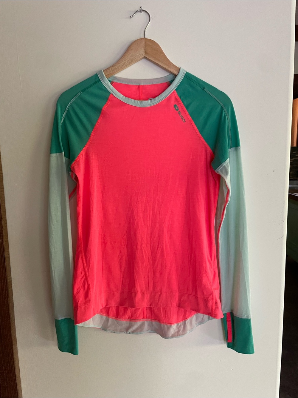 SUGOI Long Sleeve Raglan Top in Coral and Teal